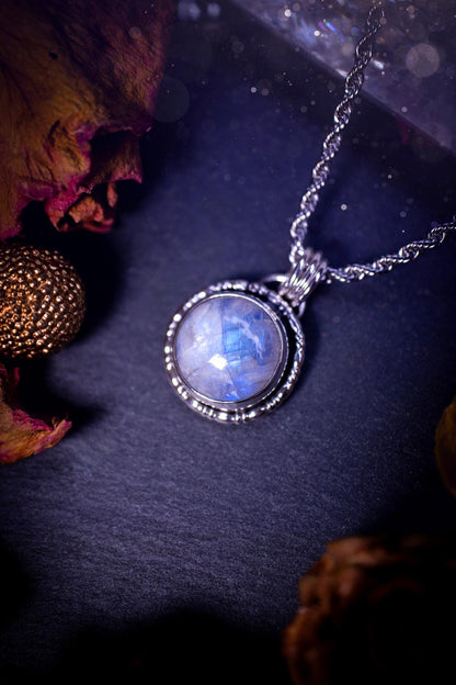 Handcrafted and unique, sterling silver, rainbow moonstone crystal pendant necklace. This necklace has been made using a beautiful flashy moonstone, with a minimal dainty design using recycled sterling silver. Ideal gift for crystal lovers. Gothic