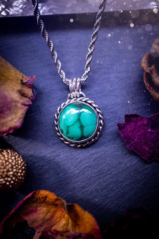 Beautifully handmade, dainty malachite sterling silver pendant necklace. This necklace features a high grade, round malachite crystal gem stone full of stunning pattern and hue. Ideal gift for crystal lovers and jewellery addicts. Gothic and hippy.