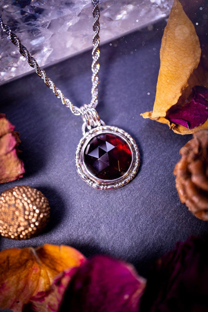 Handcrafted, one of a kind, sterling silver, garnet crystal pendant necklace. This necklace has been made using a beautiful rose cut garnet gemstone, with a minimal dainty design using recycled sterling silver. Ideal gift for crystal lovers. Gothic