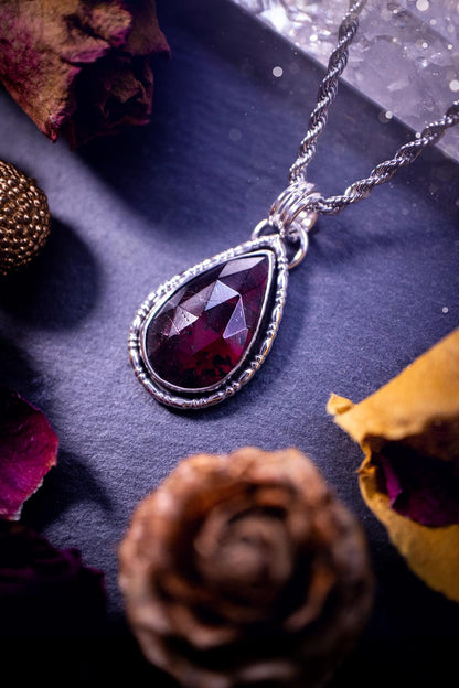 Handcrafted, one of a kind, sterling silver, garnet crystal pendant necklace. This necklace has been made using a beautiful rose cut garnet gemstone, with a minimal dainty design using recycled sterling silver. Ideal gift for crystal lovers. Gothic