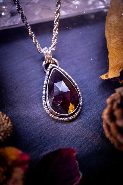 Handcrafted, one of a kind, sterling silver, garnet crystal pendant necklace. This necklace has been made using a beautiful rose cut garnet gemstone, with a minimal dainty design using recycled sterling silver. Ideal gift for crystal lovers. Gothic