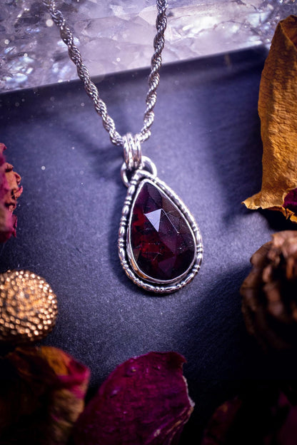 Handcrafted, one of a kind, sterling silver, garnet crystal pendant necklace. This necklace has been made using a beautiful rose cut garnet gemstone, with a minimal dainty design using recycled sterling silver. Ideal gift for crystal lovers. Gothic