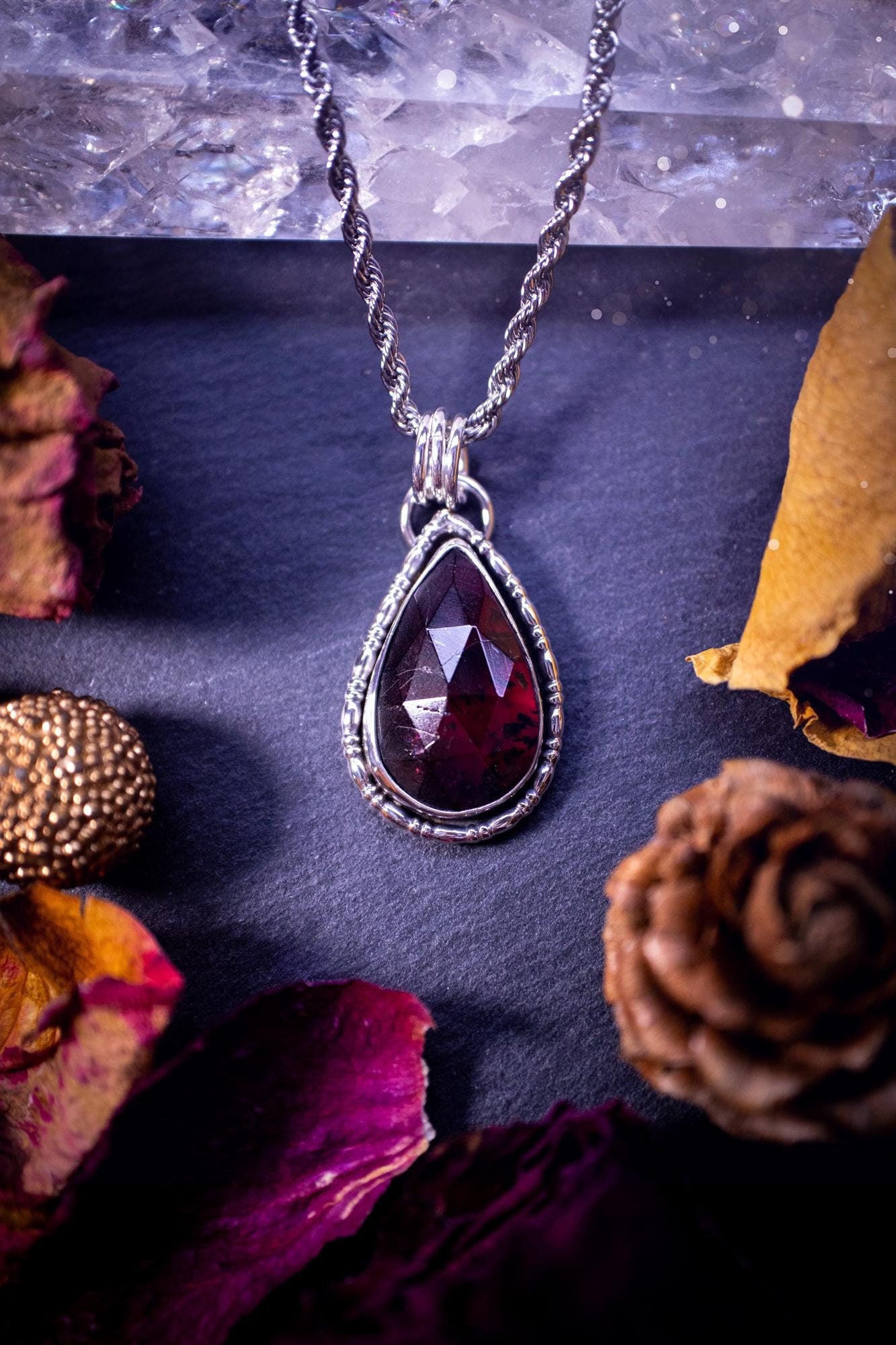 Handcrafted, one of a kind, sterling silver, garnet crystal pendant necklace. This necklace has been made using a beautiful rose cut garnet gemstone, with a minimal dainty design using recycled sterling silver. Ideal gift for crystal lovers. Gothic