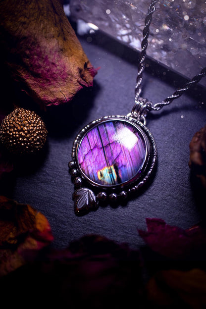 Beautiful and handmade, natural stripey blue and purple labradorite, crystal pendant necklace. This necklace has been made from fine and sterling silver and features silver leaf and ball components. The ideal gift for crystal lovers. Hippy, gothic.