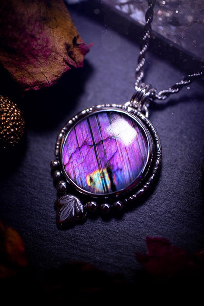 Beautiful and handmade, natural stripey blue and purple labradorite, crystal pendant necklace. This necklace has been made from fine and sterling silver and features silver leaf and ball components. The ideal gift for crystal lovers. Hippy, gothic.