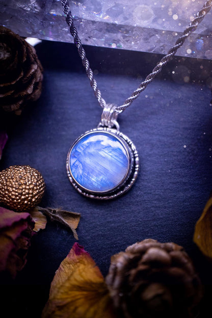 Handcrafted and unique, sterling silver, rainbow moonstone crystal pendant necklace. This necklace has been made using a beautiful flashy moonstone, with a minimal dainty design using recycled sterling silver. Ideal gift for crystal lovers. Gothic