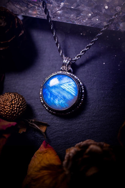 Handcrafted and unique, sterling silver, rainbow moonstone crystal pendant necklace. This necklace has been made using a beautiful flashy moonstone, with a minimal dainty design using recycled sterling silver. Ideal gift for crystal lovers. Gothic