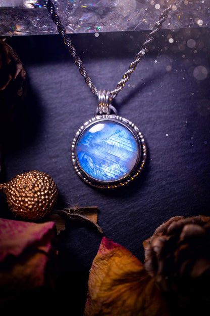 Handcrafted and unique, sterling silver, rainbow moonstone crystal pendant necklace. This necklace has been made using a beautiful flashy moonstone, with a minimal dainty design using recycled sterling silver. Ideal gift for crystal lovers. Gothic