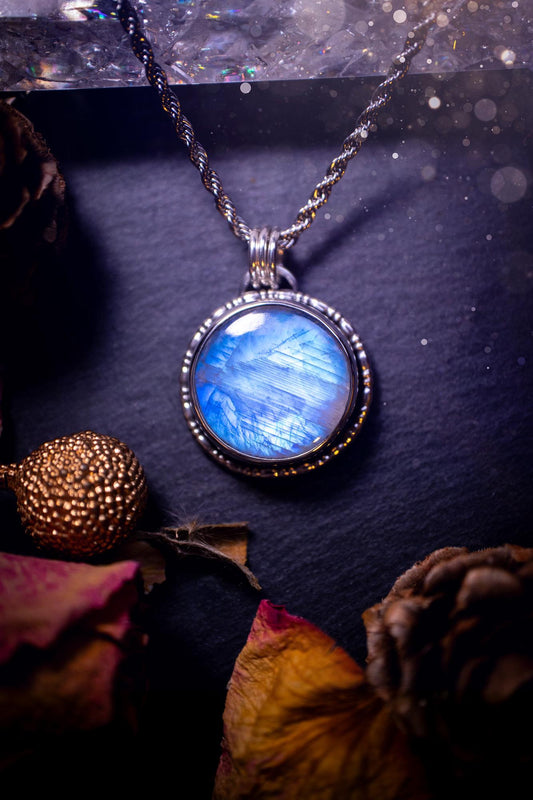 Handcrafted and unique, sterling silver, rainbow moonstone crystal pendant necklace. This necklace has been made using a beautiful flashy moonstone, with a minimal dainty design using recycled sterling silver. Ideal gift for crystal lovers. Gothic