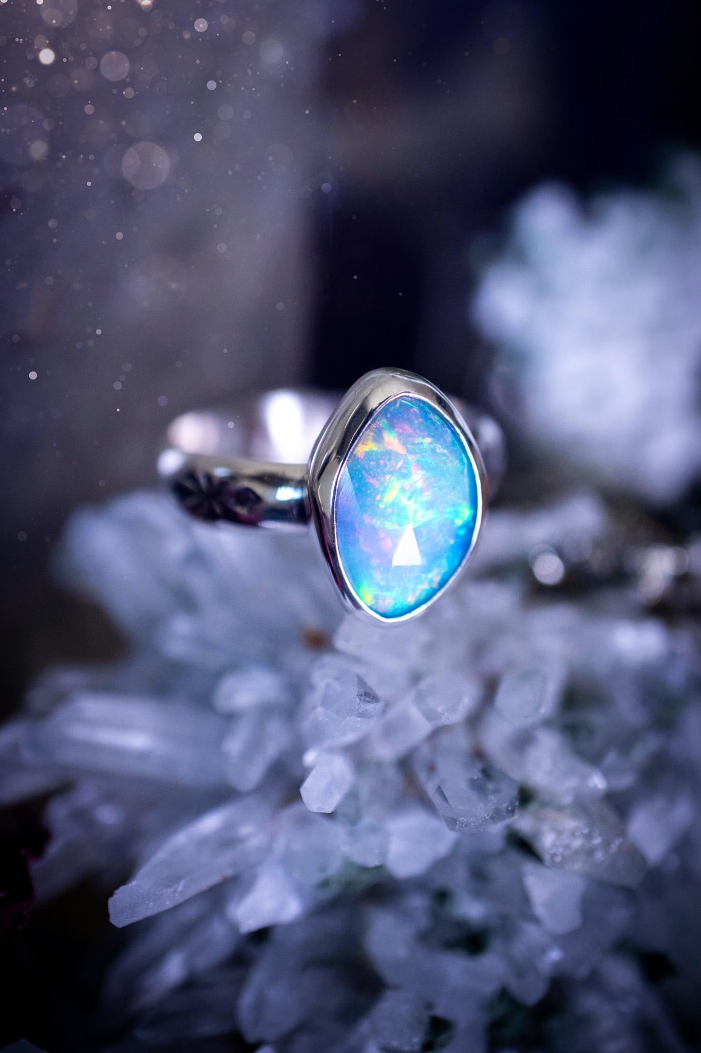 Handmade and beautiful, natural, Ethiopian welo opal, sterling silver stacking ring. This beautiful ring is a size O 1/2 and features the most stunning sparkly opal. Made from recycled fine and sterling silver with a thick stamped ring shank. The ideal gift for any crystal or jewellery lover. Opal is the birthstone for October. Gothic and witchy jewellery, hippy and bohemian.