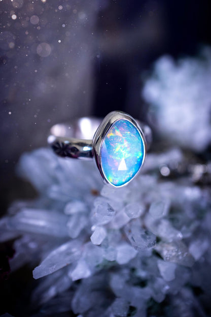 Handmade and beautiful, natural, Ethiopian welo opal, sterling silver stacking ring. This beautiful ring is a size O 1/2 and features the most stunning sparkly opal. Made from recycled fine and sterling silver with a thick stamped ring shank. The ideal gift for any crystal or jewellery lover. Opal is the birthstone for October. Gothic and witchy jewellery, hippy and bohemian.