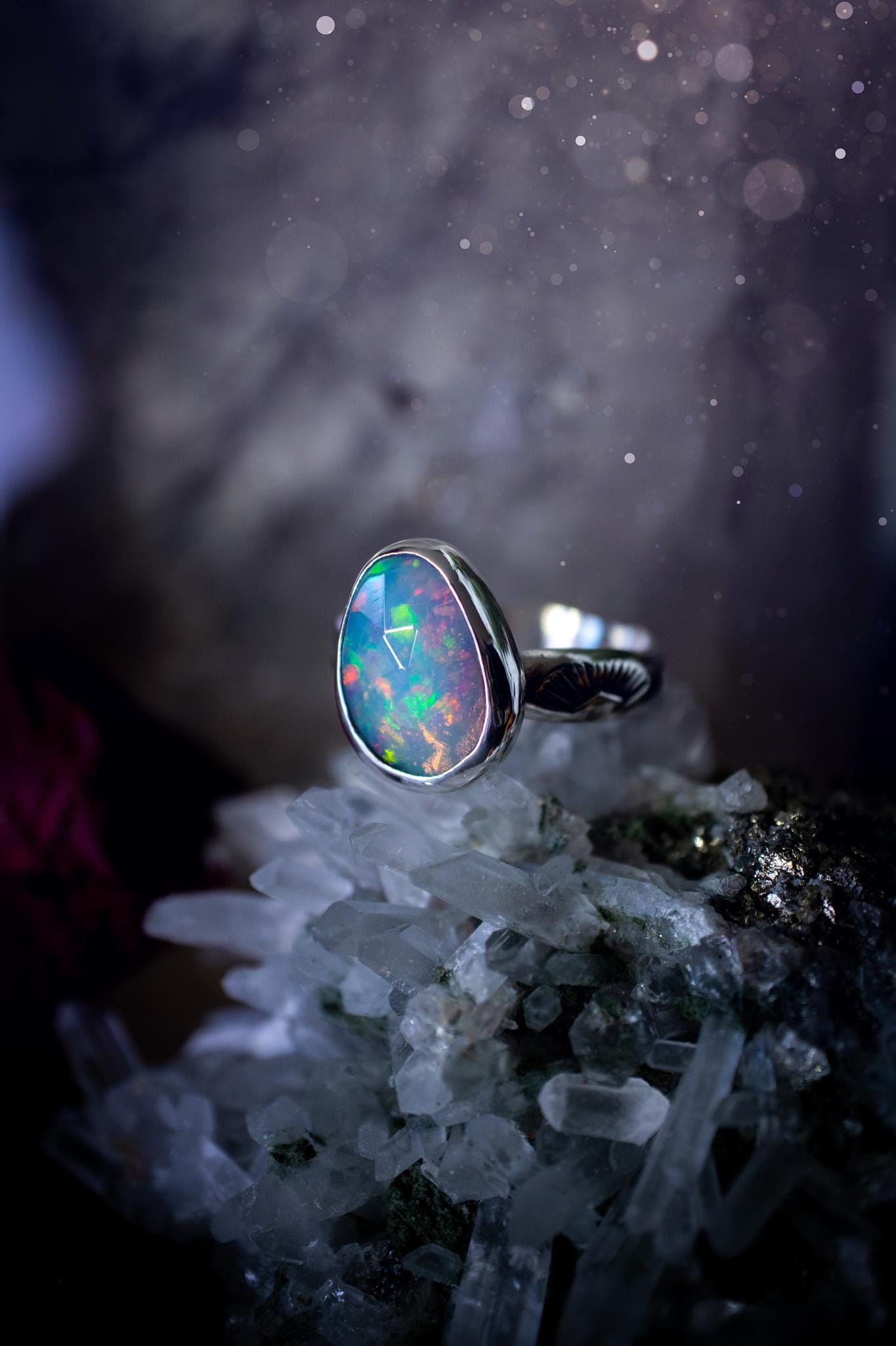 Handmade and beautiful, natural, Ethiopian welo opal, sterling silver stacking ring. This beautiful ring is a size O 1/2 and features the most stunning sparkly opal. Made from recycled fine and sterling silver with a thick stamped ring shank. The ideal gift for any crystal or jewellery lover. Opal is the birthstone for October. Gothic and witchy jewellery
