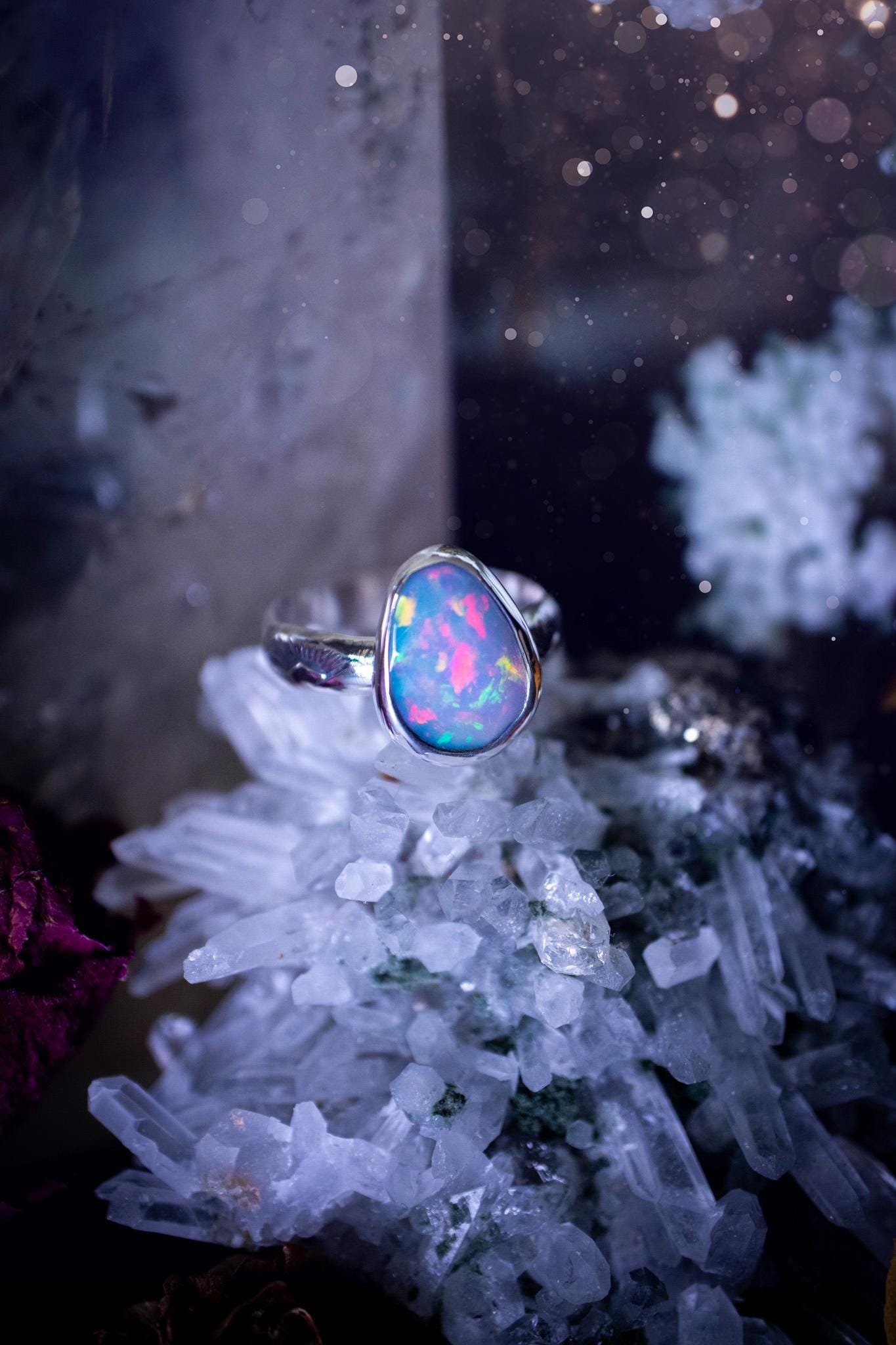 Handmade and beautiful, natural, Ethiopian welo opal, sterling silver stacking ring. This beautiful ring is a size O 1/2 and features the most stunning sparkly opal. Made from recycled fine and sterling silver with a thick stamped ring shank. The ideal gift for any crystal or jewellery lover. Opal is the birthstone for October. Gothic and witchy jewellery