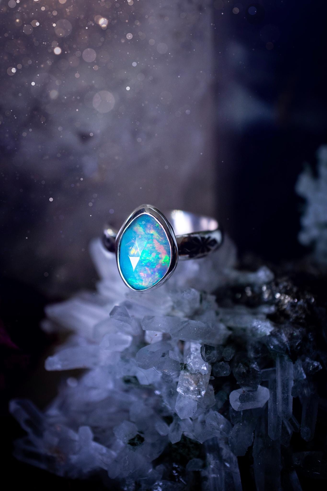 Handmade and beautiful, natural, Ethiopian welo opal, sterling silver stacking ring. This beautiful ring is a size O 1/2 and features the most stunning sparkly opal. Made from recycled fine and sterling silver with a thick stamped ring shank. The ideal gift for any crystal or jewellery lover. Opal is the birthstone for October. Gothic and witchy jewellery, hippy and bohemian.