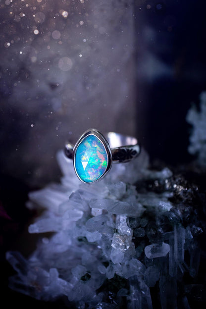 Handmade and beautiful, natural, Ethiopian welo opal, sterling silver stacking ring. This beautiful ring is a size O 1/2 and features the most stunning sparkly opal. Made from recycled fine and sterling silver with a thick stamped ring shank. The ideal gift for any crystal or jewellery lover. Opal is the birthstone for October. Gothic and witchy jewellery, hippy and bohemian.