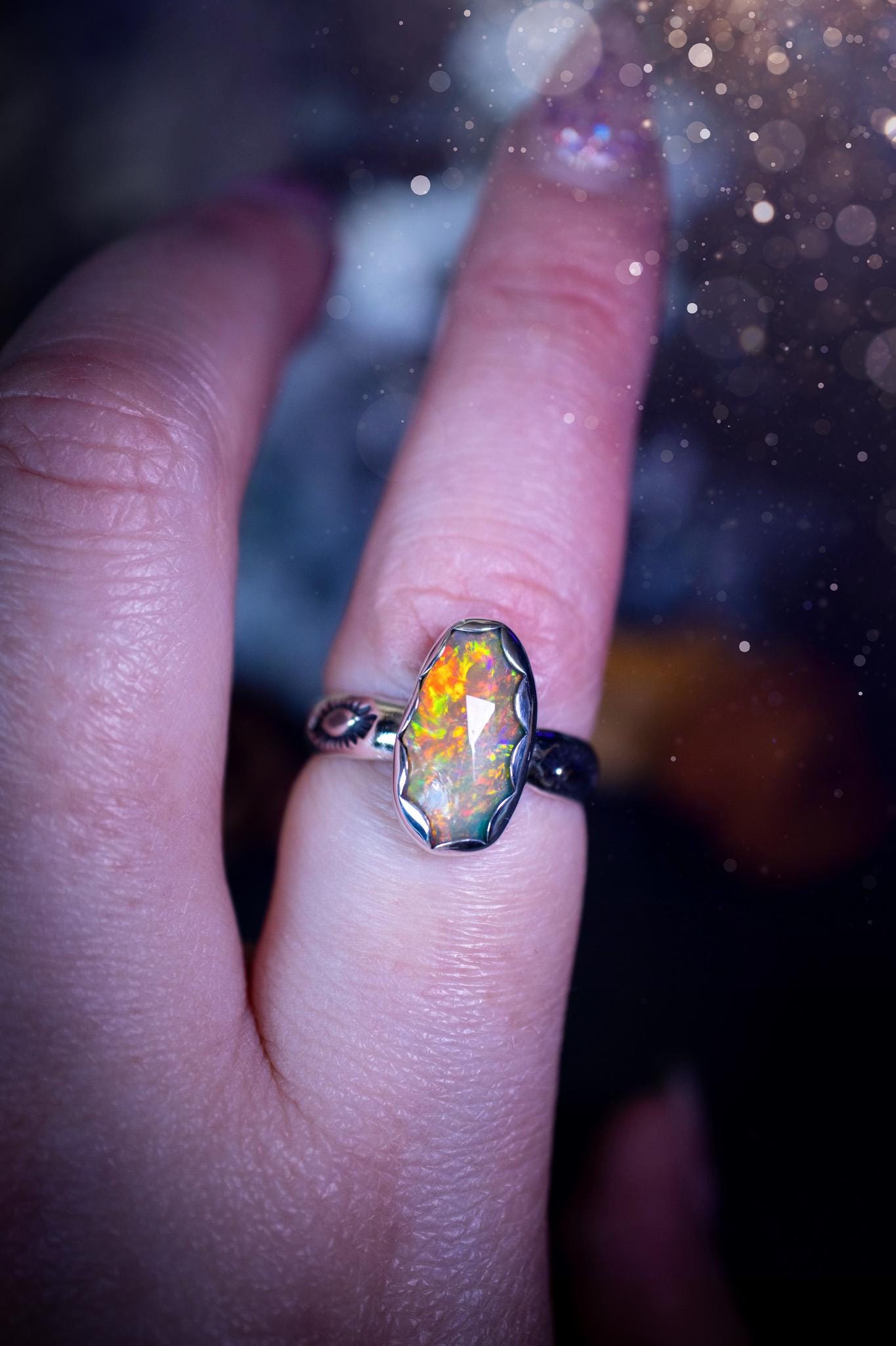 Handmade and beautiful, natural, Ethiopian welo opal, sterling silver stacking ring. This beautiful ring is a size O and features the most stunning sparkly opal. Made from recycled fine and sterling silver with a thick stamped ring shank. The ideal gift for any crystal or jewellery lover. Opal is the birthstone for October. Gothic and witchy jewellery, hippy and bohemian.