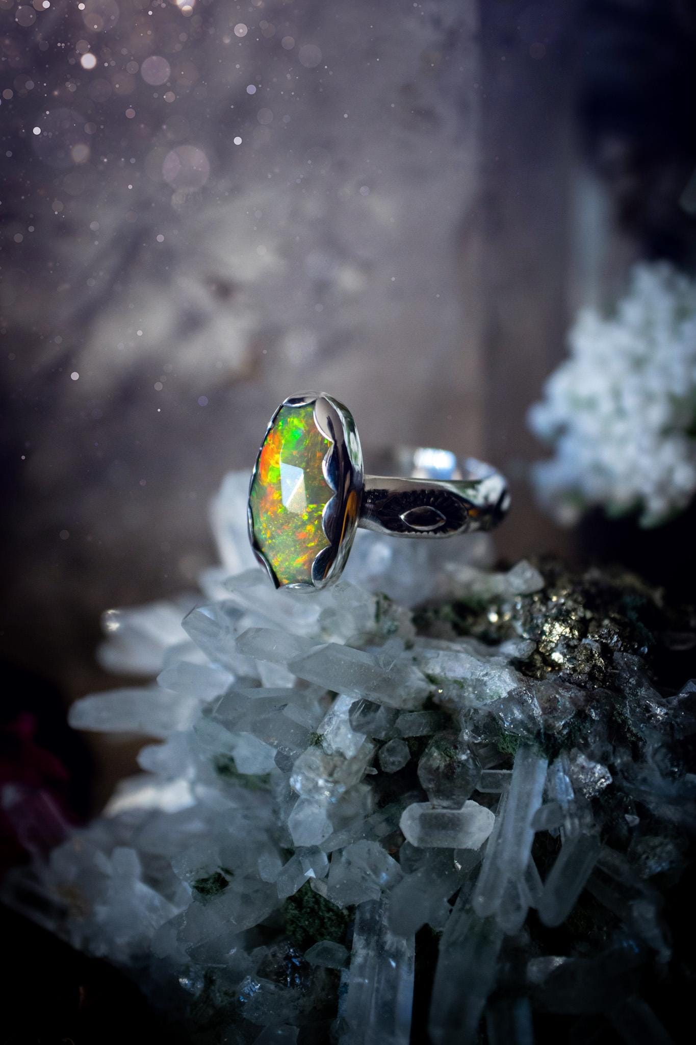 Handmade and beautiful, natural, Ethiopian welo opal, sterling silver stacking ring. This beautiful ring is a size O and features the most stunning sparkly opal. Made from recycled fine and sterling silver with a thick stamped ring shank. The ideal gift for any crystal or jewellery lover. Opal is the birthstone for October. Gothic and witchy jewellery, hippy and bohemian.