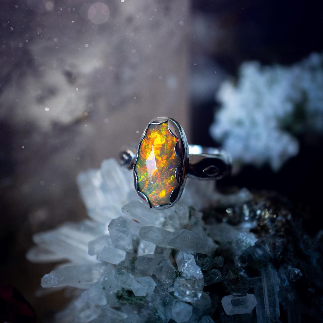 Handmade and beautiful, natural, Ethiopian welo opal, sterling silver stacking ring. This beautiful ring is a size O and features the most stunning sparkly opal. Made from recycled fine and sterling silver with a thick stamped ring shank. The ideal gift for any crystal or jewellery lover. Opal is the birthstone for October. Gothic and witchy jewellery, hippy and bohemian.