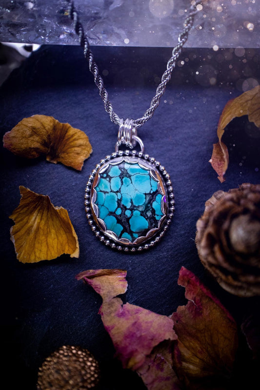 Unique and handmade, turquoise crystal pendant necklace. This Pendant has been made from recycled fine and sterling silver and features scallop and beaded wire detail around the crystal. The turquoise is A grade quality and would make the ideal gift for jewellery and crystal lovers. A crystal just like the ocean