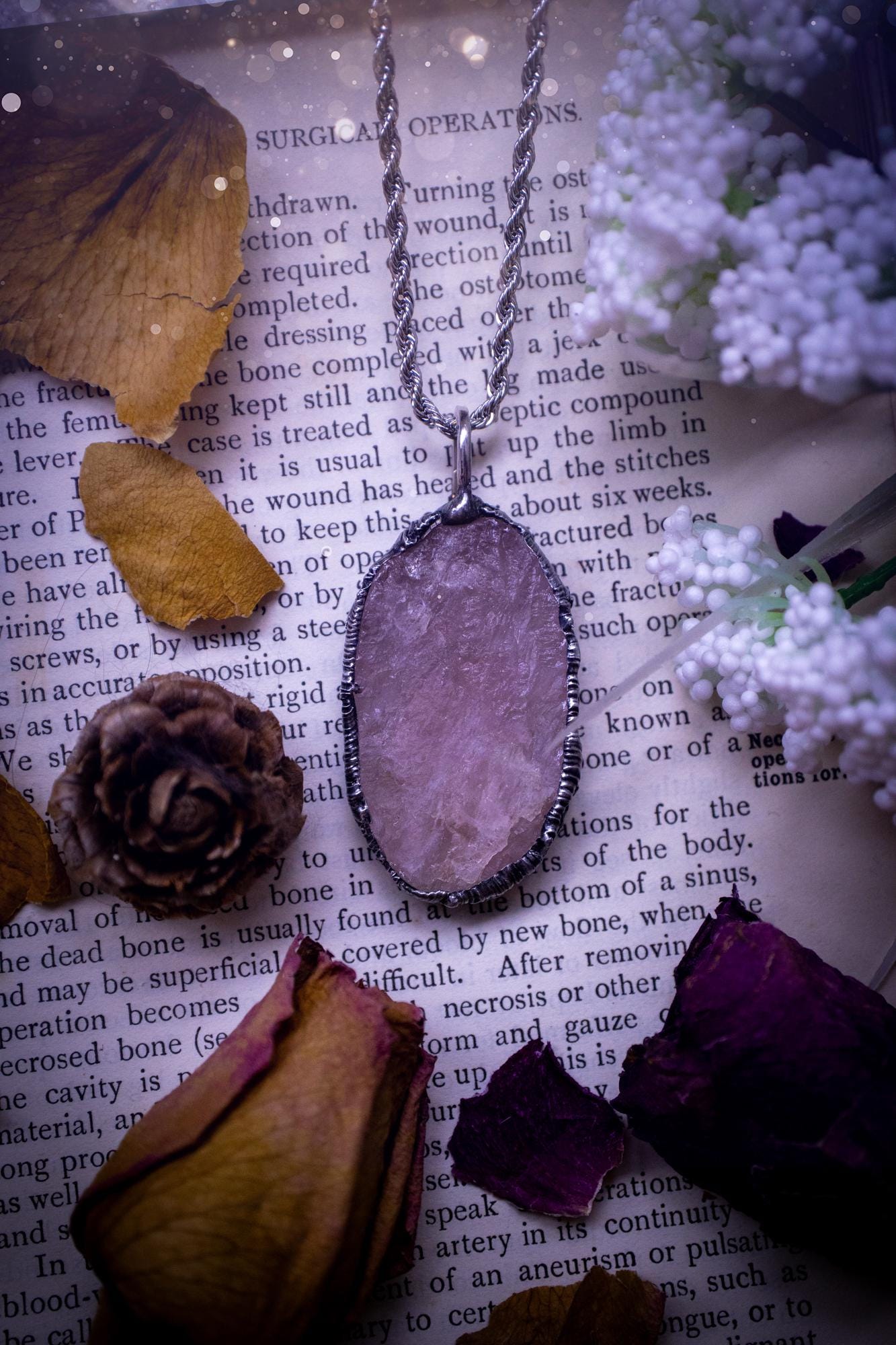 Natures finest, beautiful and raw, rose quartz, soft soldered crystal pendant necklace. This piece of jewellery is carefully handmade using the soft solder method, also known as the tiffany technique. Featuring the most natural and stunning, raw, rose quartz crystal full of pink hues. A very unique piece of jewellery. This pendant necklace would be ideal for any special occasion and for gifting to a loved one. Witchy and gothic jewellery created for the soul.