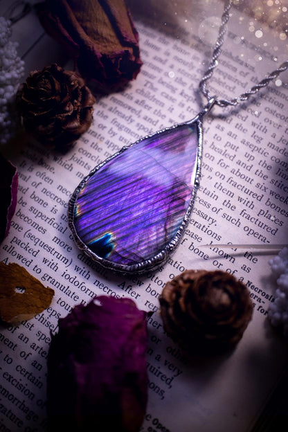 The ultimate labradorite soft soldered pendant necklace. This pendant necklace features the most beautiful and natural Labradorite spectrolite crystal that has so many hues of blue and purple, with stripes. Handmade using the tiffany technique, also known as soft soldering. This piece is made from solder which contains metals and silver and is safe to wear. The ideal gift for any jewellery lover and crystal collector! Witchy, gothic and hippy jewellery that has been made for the soul.
