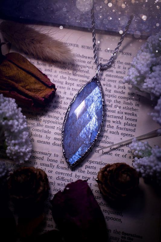 Handmade and beautiful, rose cut, belomorite, soft soldered pendant necklace. This pendant necklace features the most gorgeous and flashy belomorite moonstone crystal, full of glittery shimmer and a deep lovely blue hue. Handcrafted using the soft solder method, also known as the tiffany technique, an ancient technique used to created stained glass windows. The solder used is lead free and totally safe to wear, it contains elements of silver and polishes up to a high lustre. Gothic jewellery