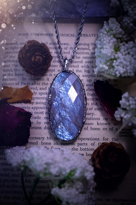 Handmade and beautiful, rose cut, belomorite, soft soldered pendant necklace. This pendant necklace features the most gorgeous and flashy belomorite moonstone crystal, full of glittery shimmer and a deep lovely blue hue. Handcrafted using the soft solder method, also known as the tiffany technique, an ancient technique used to created stained glass windows. The solder used is lead free and totally safe to wear, it contains elements of silver and polishes up to a high lustre. Gothic jewellery
