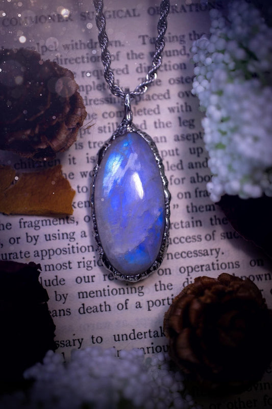 Handmade and beautiful, flashy rainbow moonstone, soft soldered pendant necklace. This pendant necklace features the most gorgeous and flashy rainbow moonstone crystal, full of glittery shimmer and a deep lovely blue hue. Handcrafted using the soft solder method, also known as the tiffany technique, an ancient technique used to created stained glass windows. The solder used is lead free and totally safe to wear, it contains elements of silver and polishes up to a high lustre. Gothic jewellery