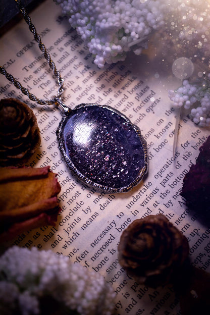 Beautiful and very unique, iolite sunstone crystal, soft soldered pendant necklace. This pendant feature the most sparkly iolite sunstone crystal and is full of purple hues with shimmer! Handmade using the tiffany technique, also known as soft soldering. This piece is made from solder which contains metals and silver and is safe to wear. The ideal gift for any jewellery lover and crystal collector! Witchy, gothic and hippy jewellery that has been made for the soul.