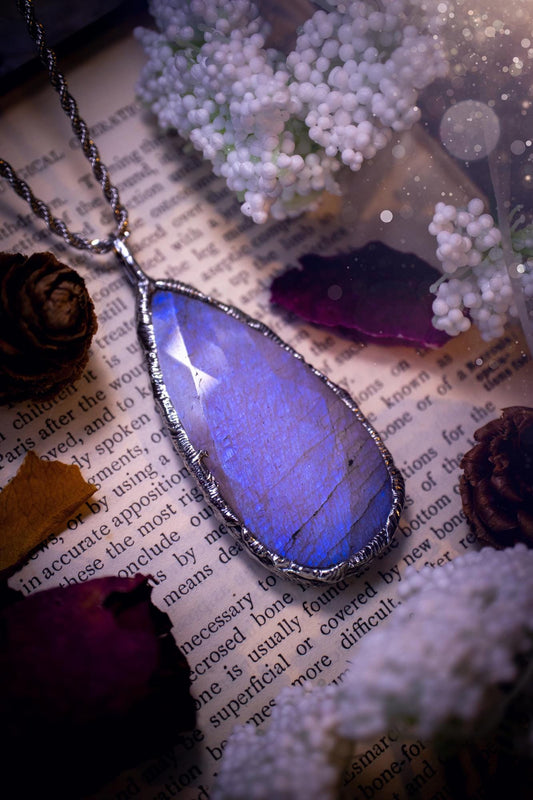 Handmade and beautiful, rose cut, belomorite, soft soldered pendant necklace. This pendant necklace features the most gorgeous and flashy belomorite moonstone crystal, full of glittery shimmer and a deep lovely blue hue. Handcrafted using the soft solder method, also known as the tiffany technique, an ancient technique used to created stained glass windows. The solder used is lead free and totally safe to wear, it contains elements of silver and polishes up to a high lustre. Gothic jewellery