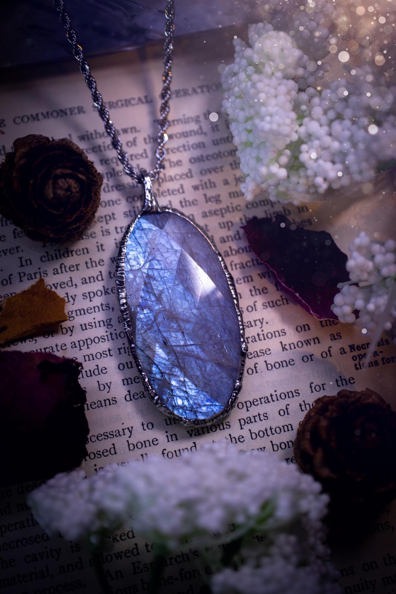 Handmade and beautiful, rose cut, belomorite, soft soldered pendant necklace. This pendant necklace features the most gorgeous and flashy belomorite moonstone crystal, full of glittery shimmer and a deep lovely blue hue. Handcrafted using the soft solder method, also known as the tiffany technique, an ancient technique used to created stained glass windows. The solder used is lead free and totally safe to wear, it contains elements of silver and polishes up to a high lustre. Gothic jewellery