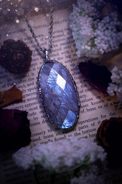 Handmade and beautiful, rose cut, belomorite, soft soldered pendant necklace. This pendant necklace features the most gorgeous and flashy belomorite moonstone crystal, full of glittery shimmer and a deep lovely blue hue. Handcrafted using the soft solder method, also known as the tiffany technique, an ancient technique used to created stained glass windows. The solder used is lead free and totally safe to wear, it contains elements of silver and polishes up to a high lustre. Gothic jewellery