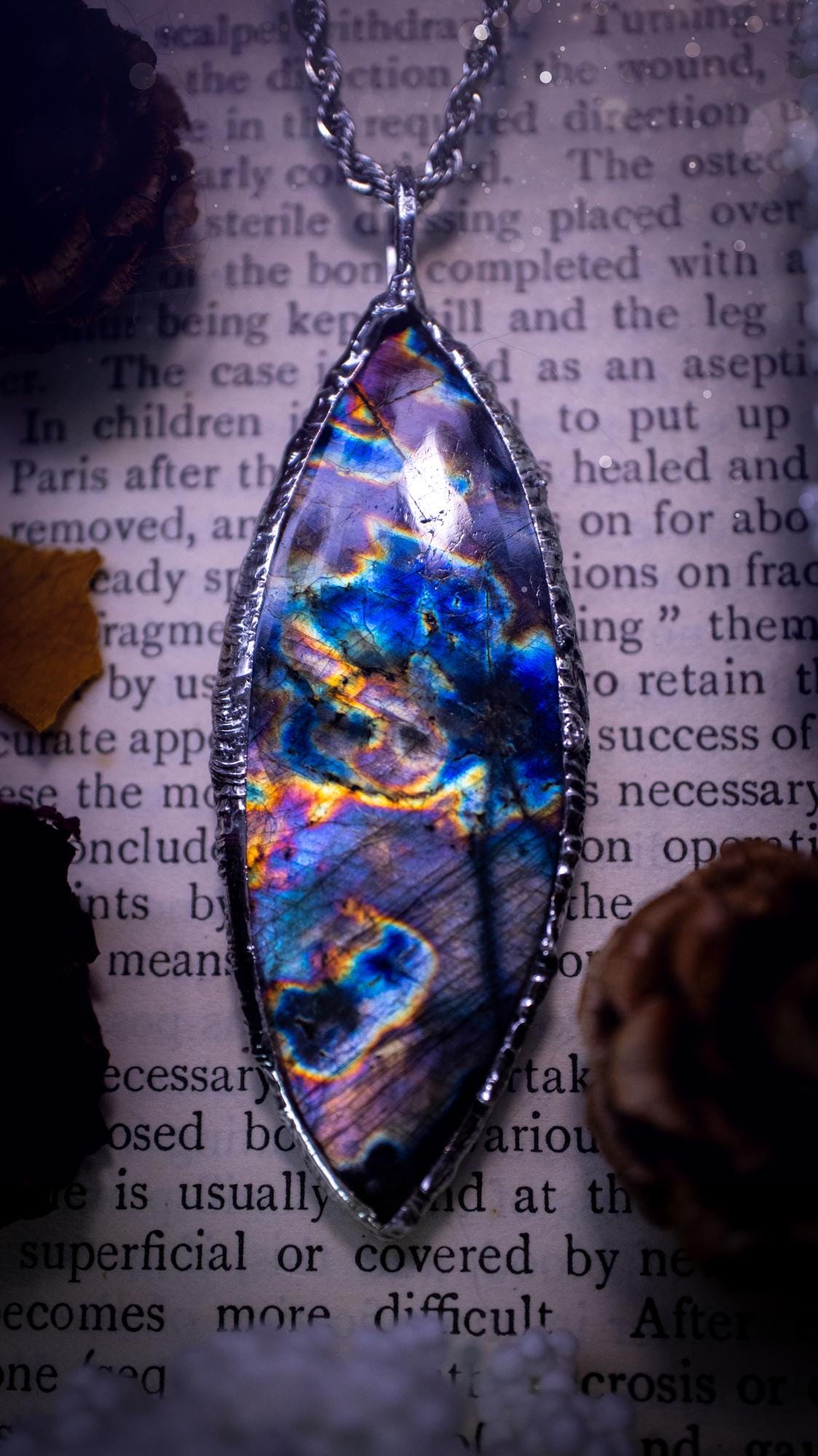 The ultimate labradorite spectrolite, soft soldered pendant necklace. This pendant necklace features the most beautiful and natural Labradorite spectrolite crystal that has so many hues of purple, blues and silvers. Handmade using the tiffany technique, also known as soft soldering. This piece is made from solder which contains metals and silver and is safe to wear. The ideal gift for any jewellery lover and crystal collector! Witchy, gothic and hippy jewellery that has been made for the soul.