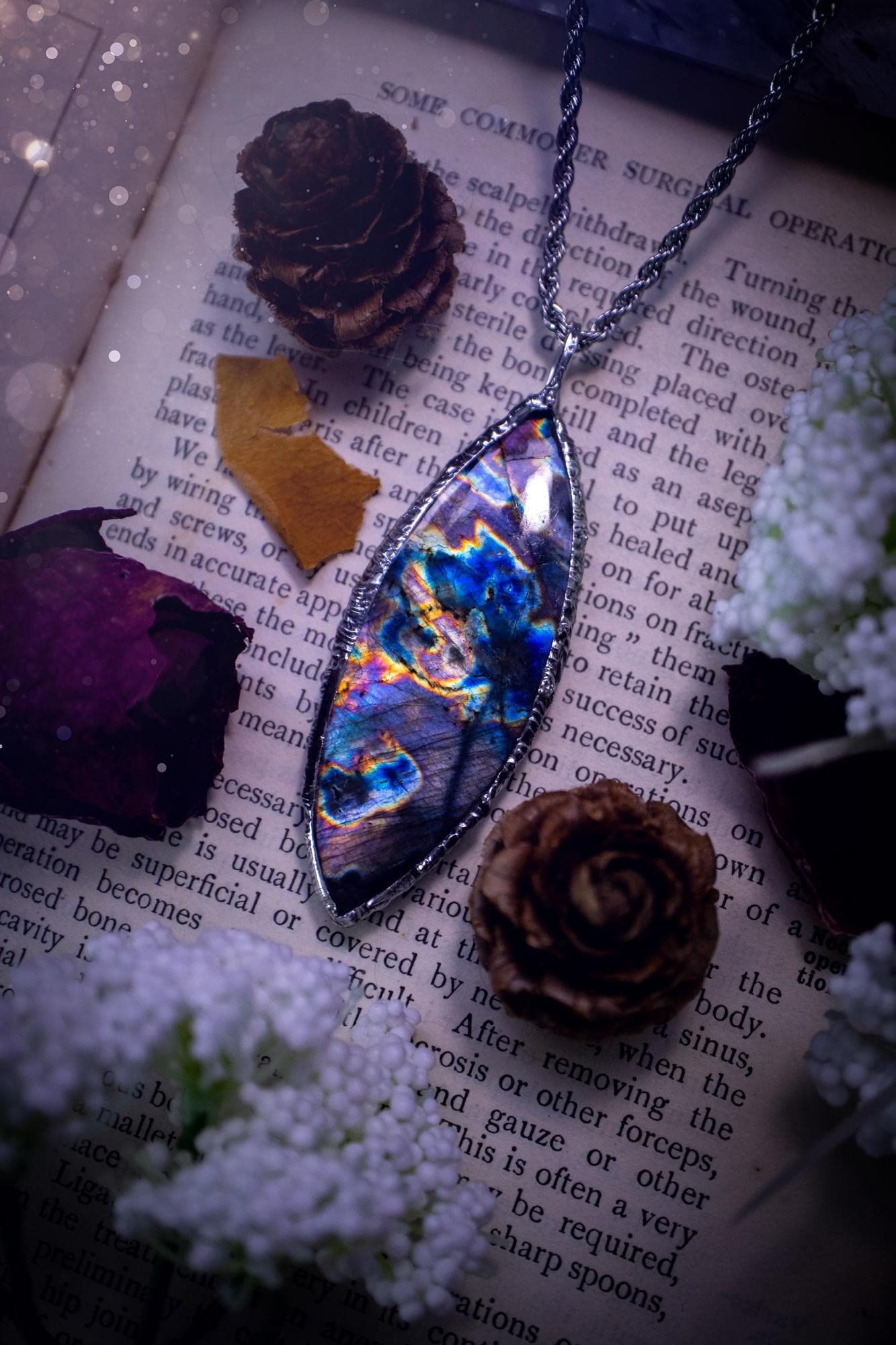 The ultimate labradorite spectrolite, soft soldered pendant necklace. This pendant necklace features the most beautiful and natural Labradorite spectrolite crystal that has so many hues of purple, blues and silvers. Handmade using the tiffany technique, also known as soft soldering. This piece is made from solder which contains metals and silver and is safe to wear. The ideal gift for any jewellery lover and crystal collector! Witchy, gothic and hippy jewellery that has been made for the soul.