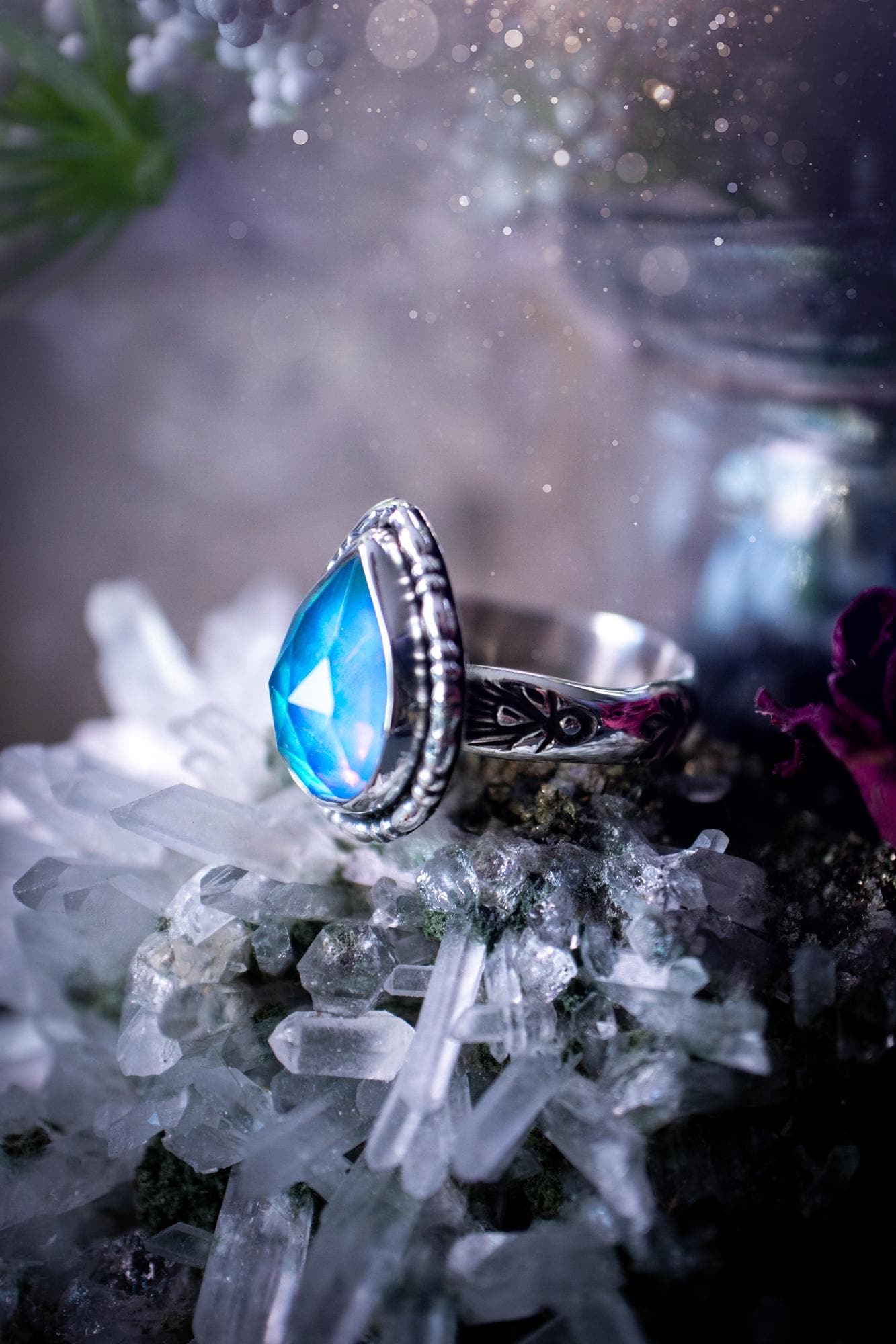Beautiful and handmade, aurora synthetic opal, sterling silver bespoke ring. This ring has been handmade using a mix of recycled fine and sterling silver. Featuring a beautiful multi flash aurora opal that is full of blue, greens and pink hues depending on the angle. The stone is also rose cut and has a lovely sparkle. This piece is ideal for any jewellery or crystal lover and is full of witchy and hippy vibes! A beautiful mini statement ring for anyone&#39;s collection.