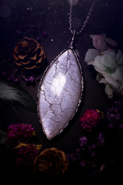 Handmade and beautiful, flashy, grey, soft soldered pendant necklace. This pendant necklace features the most gorgeous and flashy grey moonstone crystal, full of glittery shimmer and a deep lovely silvery grey hue. Handcrafted using the soft solder method, also known as the tiffany technique, an ancient technique used to created stained glass windows. The solder used is lead free and totally safe to wear, it contains elements of silver and polishes up to a high lustre. Gothic witchy jewellery