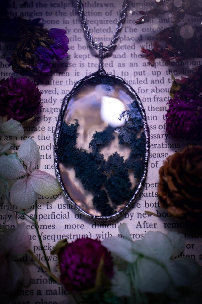 Absolutely stunning, and totally unique, moss agate crystal, soft soldered pendant necklace. This beautiful pendant features a very high quality moss agate crystal that has beautiful mossy definition and patterns. The crystal looks like it has a little forest captured inside. This pendant has been made using the soft solder method also known as the tiffany technique. This piece of jewellery would be ideal for any jewellery or crystal lover and is full of hippy, gothic and witchy goodness!