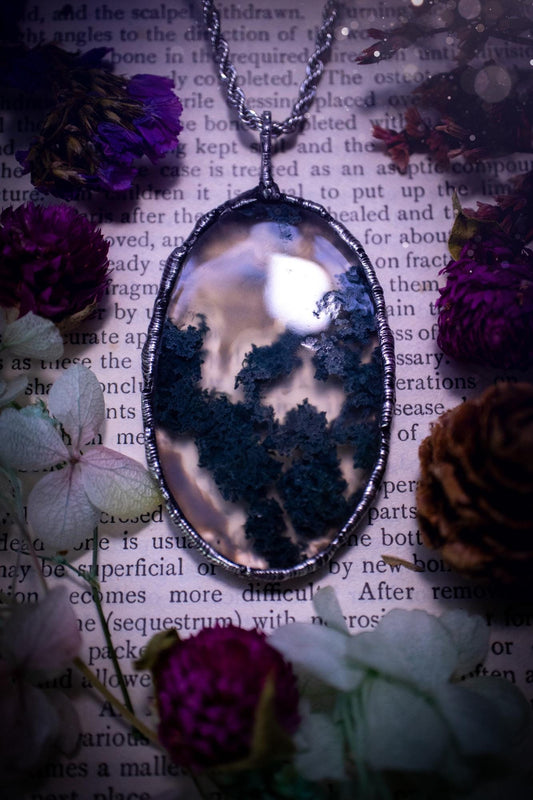 Absolutely stunning, and totally unique, moss agate crystal, soft soldered pendant necklace. This beautiful pendant features a very high quality moss agate crystal that has beautiful mossy definition and patterns. The crystal looks like it has a little forest captured inside. This pendant has been made using the soft solder method also known as the tiffany technique. This piece of jewellery would be ideal for any jewellery or crystal lover and is full of hippy, gothic and witchy goodness!