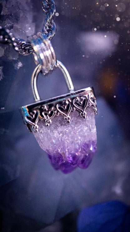 Handmade and beautiful, natural amethyst crystal cluster pendant necklace. This lovely piece of jewellery is made from a mix of fine and sterling silver. It features a beautiful mini amethyst crystal cluster that has lots of formations and rainbows within the inclusions! Full of sparkle with a lovely deep purple hue at the points. This piece of jewellery would be ideal for any crystal and jewellery lover, or even for birthdays as amethyst is the birthstone for February. Gothic and witchy