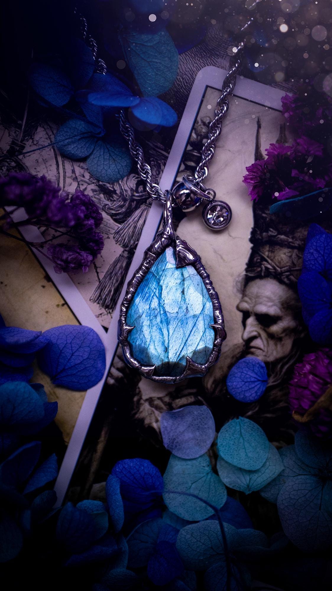 A stunning, and one off pendant necklace. Icy blue labradorite with a facet cut soft soldered pendant. This piece of jewellery has been handmade and features a very high quality, icy blue, natural labradorite crystal. Made using the soft solder method with lead free solder that contains mixed metals including silver. The piece is then polished to a high lustre. Featuring little claws for that gothic and witchy look. Ideal for any crystal and jewellery lover who would like a one of a kind piece.