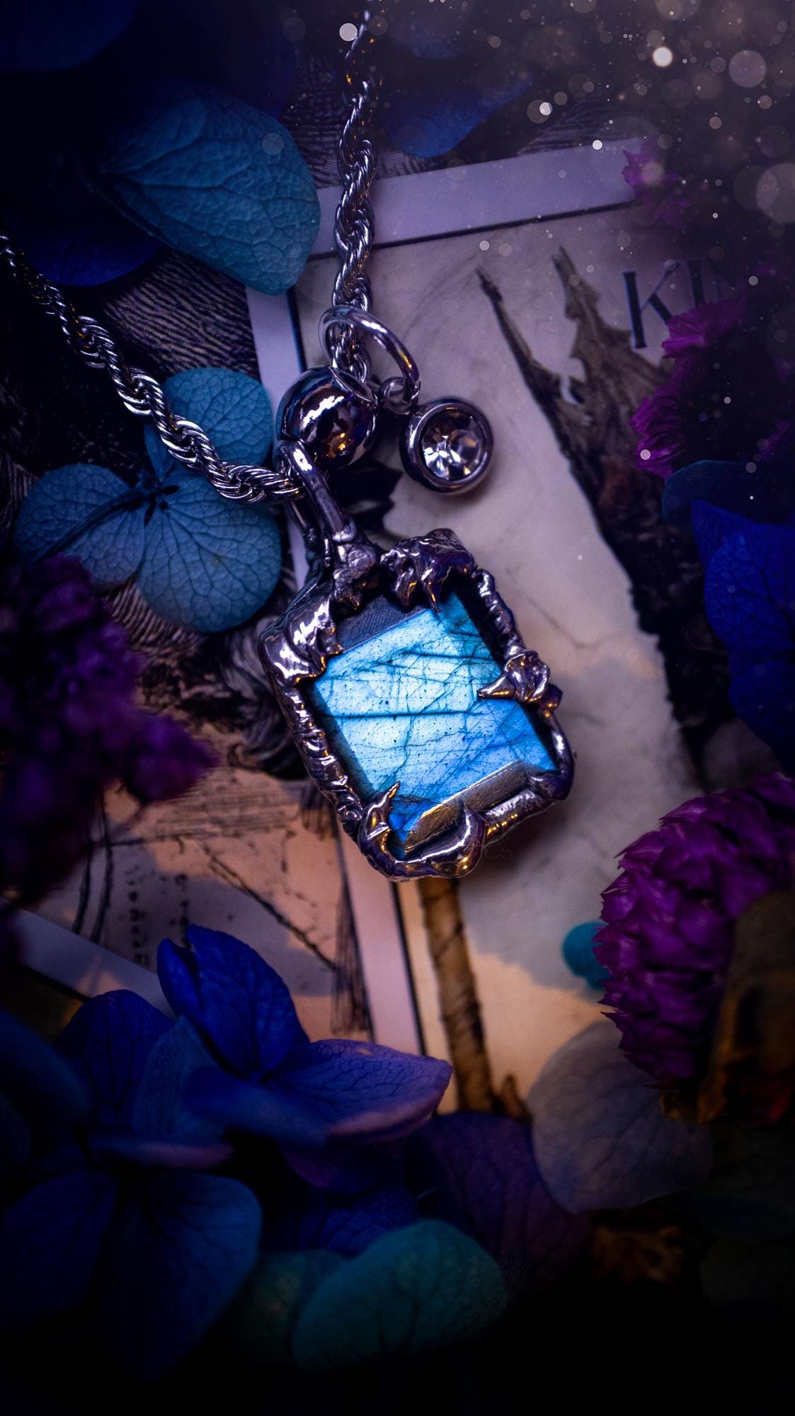 A stunning, and one off pendant necklace. Icy blue labradorite with a facet cut soft soldered pendant. This piece of jewellery has been handmade and features a very high quality, icy blue, natural labradorite crystal. Made using the soft solder method with lead free solder that contains mixed metals including silver. The piece is then polished to a high lustre. Featuring little claws for that gothic and witchy look. Ideal for any crystal and jewellery lover who would like a one of a kind piece.