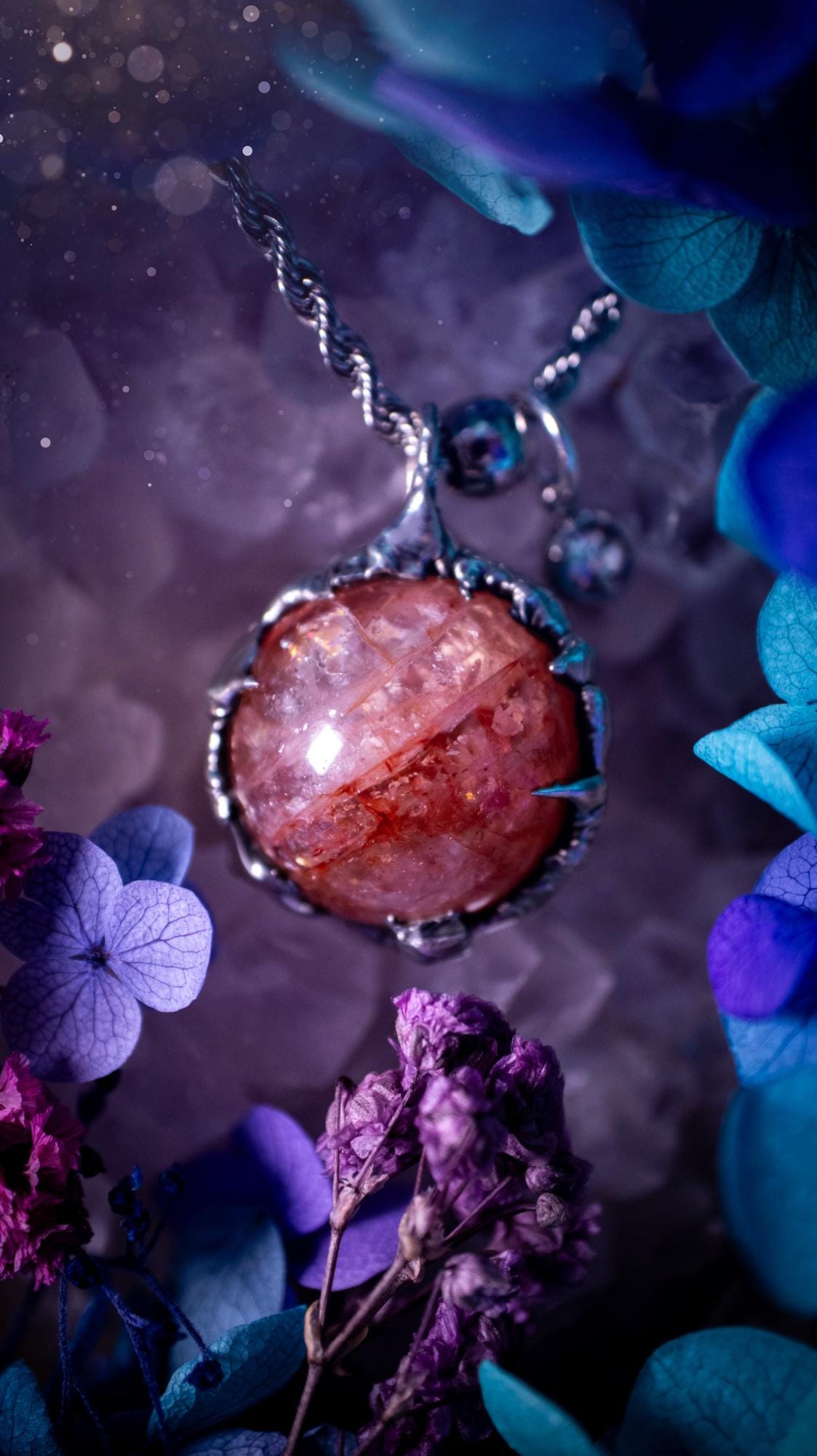 Handmade and bespoke fire quartz sphere soft solder pendant necklace. This unique pendant necklace has a stunning fire quarts crystal that is full of inclusions and little rainbows! Handcrafted using the soft solder method with lead free solder containing mixed metals and silver. The piece has then been polished to a high shine lustre. This pendant is such a bespoke piece and would be ideal for any crystal and jewellery lover. Can be worn both ways. Gothic, witchy and hippy soul jewellery