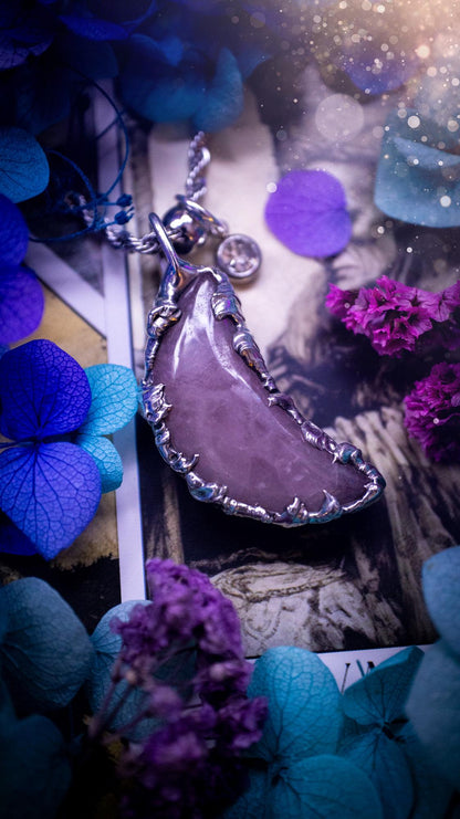 Beautifully bespoke and handcrafted, rose quartz, soft soldered moon pendant necklace. This necklace has been handmade using the soft solder method with lead free solder with mix metals including silver. Featuring a gorgeous rose quartz moon that is a dusty pink colour. This piece is very unique and comes with its own little cubic zirconia charm. This pendant necklace would be suitable for anyone who loves crystals and jewellery, and that also loves a gothic and witchy vibe! Total soul jewellery