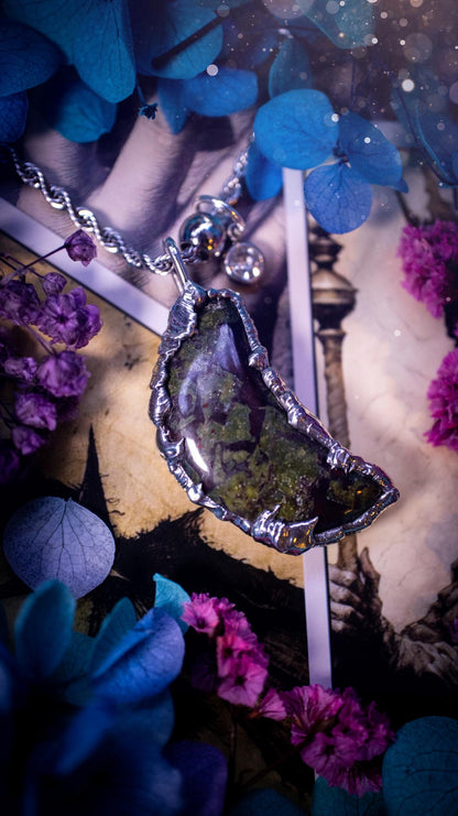 Beautifully bespoke and handcrafted, blood stone, soft soldered moon pendant necklace. This necklace has been handmade using the soft solder method with lead free solder with mix metals including silver. Featuring a gorgeous blood stone moon with stunning patterns. This piece is very unique and comes with its own little cubic zirconia charm. This pendant necklace would be suitable for anyone who loves crystals and jewellery, and that also loves a gothic and witchy vibe! Total soul jewellery