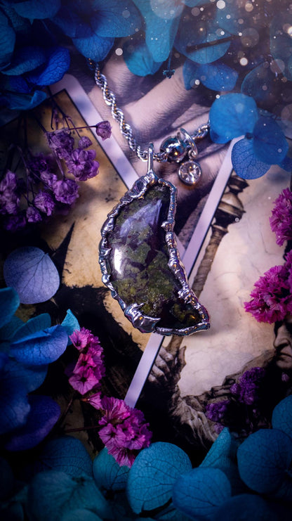 Beautifully bespoke and handcrafted, blood stone, soft soldered moon pendant necklace. This necklace has been handmade using the soft solder method with lead free solder with mix metals including silver. Featuring a gorgeous blood stone moon with stunning patterns. This piece is very unique and comes with its own little cubic zirconia charm. This pendant necklace would be suitable for anyone who loves crystals and jewellery, and that also loves a gothic and witchy vibe! Total soul jewellery