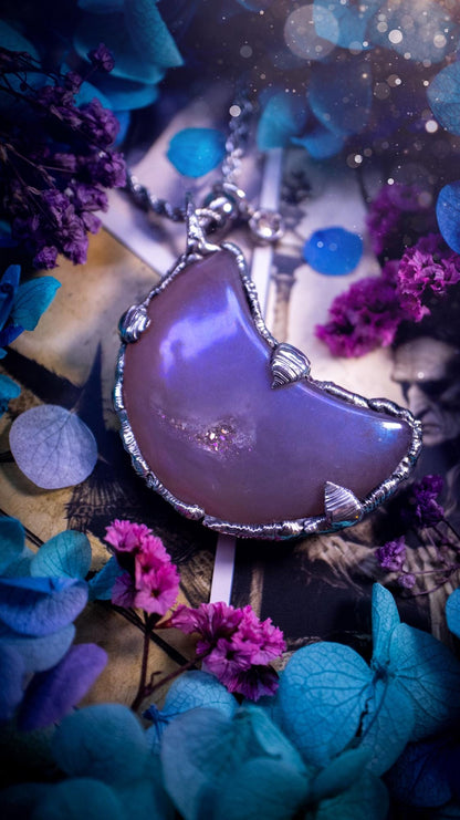 Beautifully bespoke, aurora coated agate, soft soldered moon pendant necklace. This necklace has been handmade using the soft solder method with lead free solder with mix metals including silver. Featuring a gorgeous aurora coated agate moon with a sparkly druzy pocket. This piece is very unique and comes with its own little cubic zirconia charm. This pendant necklace would be suitable for anyone who loves crystals and jewellery, and that also loves a gothic and witchy vibe! Total soul jewellery