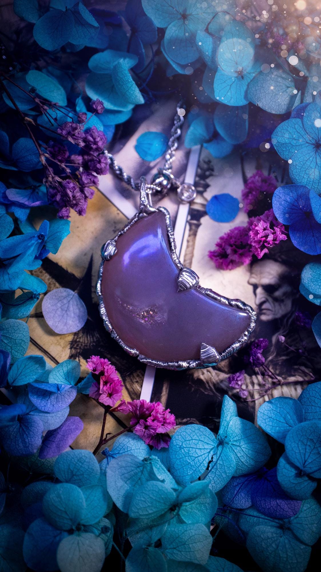 Beautifully bespoke, aurora coated agate, soft soldered moon pendant necklace. This necklace has been handmade using the soft solder method with lead free solder with mix metals including silver. Featuring a gorgeous aurora coated agate moon with a sparkly druzy pocket. This piece is very unique and comes with its own little cubic zirconia charm. This pendant necklace would be suitable for anyone who loves crystals and jewellery, and that also loves a gothic and witchy vibe! Total soul jewellery