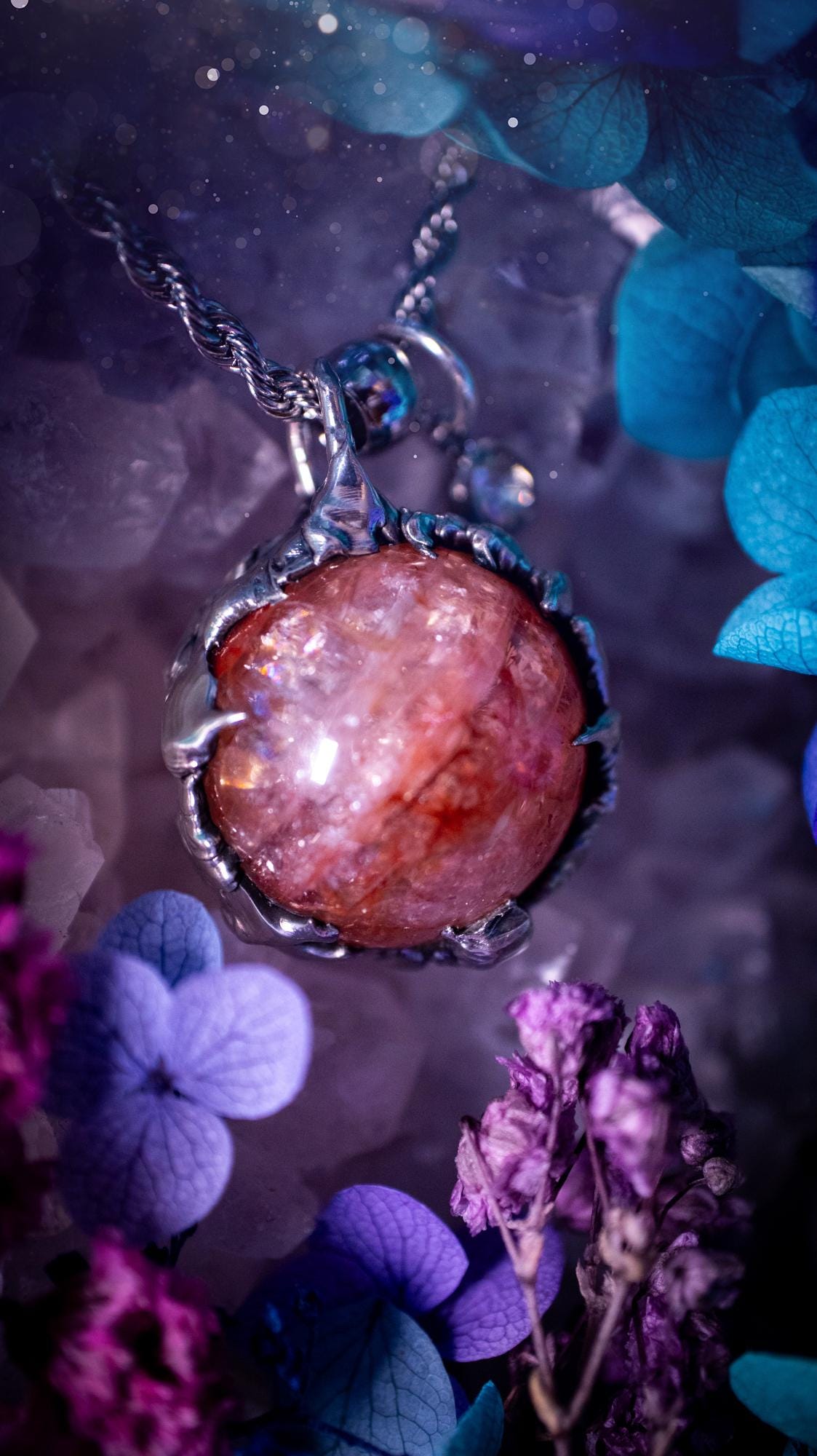 Handmade and bespoke fire quartz sphere soft solder pendant necklace. This unique pendant necklace has a stunning fire quarts crystal that is full of inclusions and little rainbows! Handcrafted using the soft solder method with lead free solder containing mixed metals and silver. The piece has then been polished to a high shine lustre. This pendant is such a bespoke piece and would be ideal for any crystal and jewellery lover. Can be worn both ways. Gothic, witchy and hippy soul jewellery