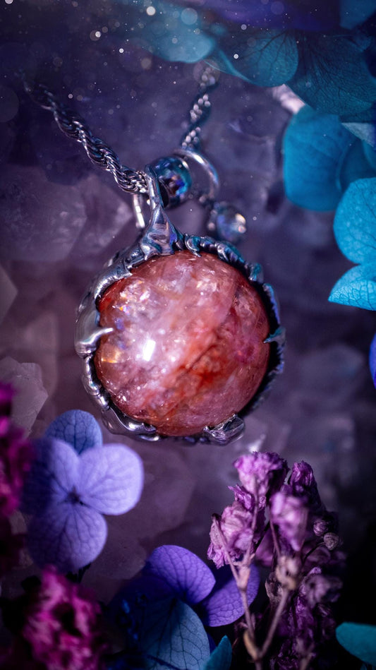 Handmade and bespoke fire quartz sphere soft solder pendant necklace. This unique pendant necklace has a stunning fire quarts crystal that is full of inclusions and little rainbows! Handcrafted using the soft solder method with lead free solder containing mixed metals and silver. The piece has then been polished to a high shine lustre. This pendant is such a bespoke piece and would be ideal for any crystal and jewellery lover. Can be worn both ways. Gothic, witchy and hippy soul jewellery