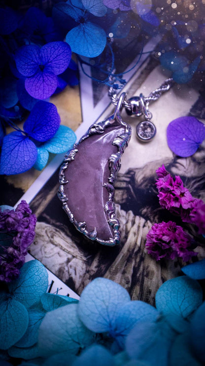 Beautifully bespoke and handcrafted, rose quartz, soft soldered moon pendant necklace. This necklace has been handmade using the soft solder method with lead free solder with mix metals including silver. Featuring a gorgeous rose quartz moon that is a dusty pink colour. This piece is very unique and comes with its own little cubic zirconia charm. This pendant necklace would be suitable for anyone who loves crystals and jewellery, and that also loves a gothic and witchy vibe! Total soul jewellery